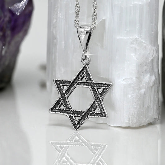 Colgante estrella de david en plata 950