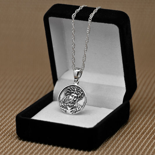 Colgante rostro de cristo con corona de espinas en plata 925